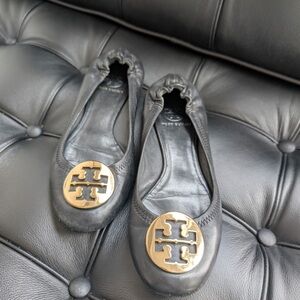 Tory Burch Black Flats with Gold Emblem